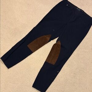 Women riding navy and Brown Pants